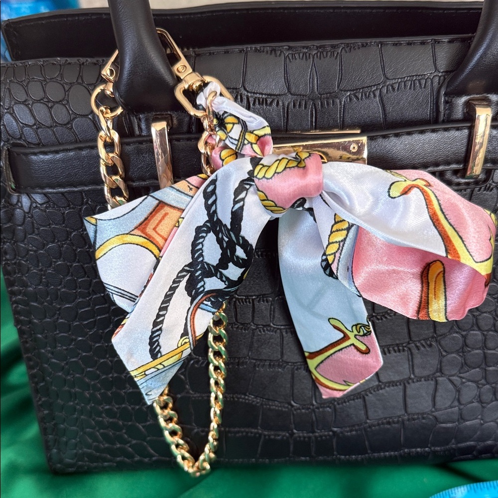 Elegant gold purse charm with Scarf Accent